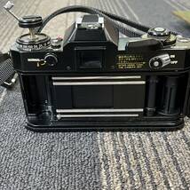 【TS0216】キヤノン CANON EF フィルムカメラ FD 50mm 1:1.4 S.S.C. レンズ ストロボ ケース付き 動作未確認_画像7