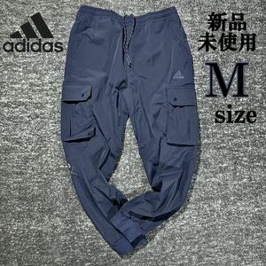 1円〜 新品 adidas PRSVE CARGO PANTS Msize アディダス カーゴパンツ 紺 ネイビー ロングパンツ ストレッチ 人気 収納 スポーツ ジョガー