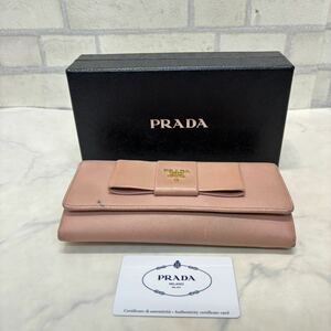 箱、ギャランティカード付き PRADA プラダ サフィアーノ フィオッコ レザー 財布 1M1132 プラチノ ピンク リボン カーフ 長財布 レディース