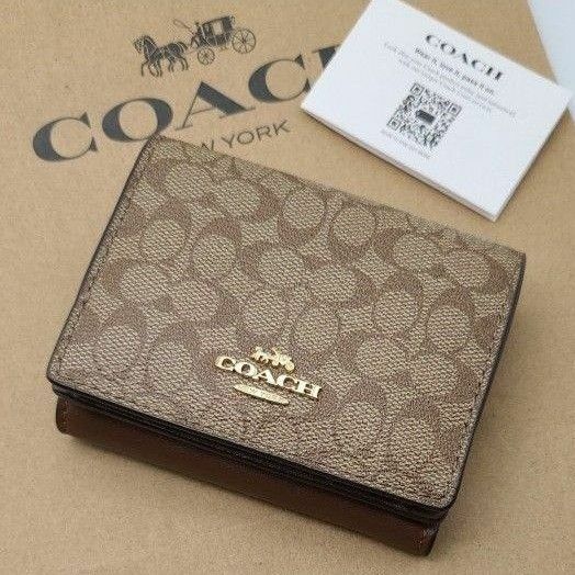 新品　COACH　折り財布　シグネチャー コーテッド キャンバス