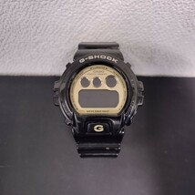 NR846 G-SHOCK CASIO カシオ 腕時計 ジーショック ブラック Gショック デジタル文字盤 ゴールド SHOCK RESIST 3230 DW-6900CB 動作未確認_画像1
