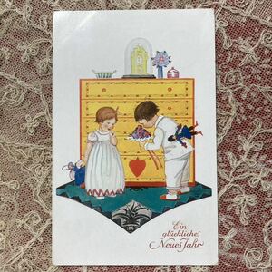 99/2 ＊ アンティーク　ヴィンテージ　ポストカード ＊ 絵葉書　MELA KOEHLER 新年おめでとう　子供たち　お人形　花束