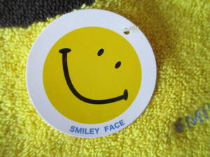 サイズ約25×25ｃｍほどの大きさのタオルハンカチ新品タグ付きスマイル柄SMILEY FACE綿１００％ハーベイ・ボール・ワールド・スマイル財団