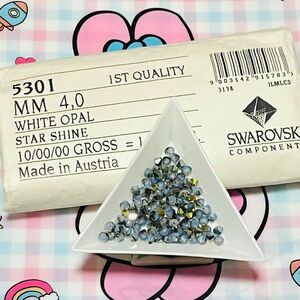 スワロフスキー　#5301 ソロバン 4mm ホワイトオパール　スターシャイン　100粒