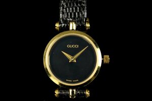 グッチ GUCCI 腕時計 クォーツ ラウンド 文字盤黒 ゴールド色 4500Lレザーブレス ジャンク 現状品