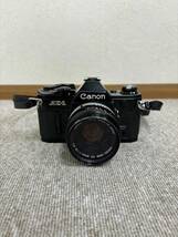 【UAK-19IM】1円 ～キャノン CANON AE-1 レンズ付 FD 50mm F1.8 S.C 一眼レフ フィルムカメラ 動作未確認 現状品 _画像1