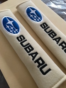 送料無料！さり気なく目立つ　SUBARU　スバルロゴ　アイボリー色シートベルトパッド　インプレッサ　レヴォーグ　レガシィ