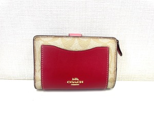 4559★COACH 二つ折り財布◇中古品 シグネチャー柄 赤 ピンク◇ブランド小物 コーチ レディース 女性用 大容量