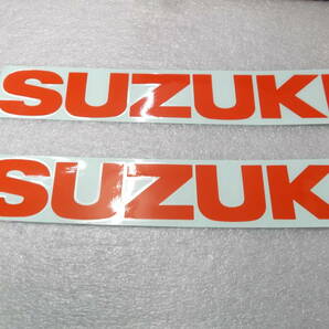 GSX250Sカタナ(GJ76A)/GSX400Sカタナ(GK77A)/GSX750Sカタナ(１/2型)/GSX1100Sカタナ(GS110X/GU76A)純正タンクステッカー(オレンジ)２個新品の画像1