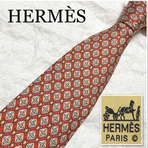 ■美品■HERMES エルメス　ネクタイ　格子　スクエア　装飾　総柄　シルク100% フランス製　オレンジ系