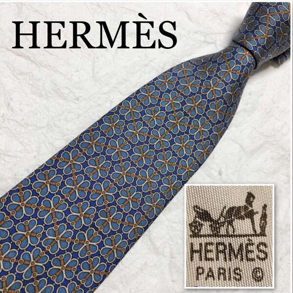 HERMES エルメス　ネクタイ　クローバー　金具　ベルト　総柄　シルク100% フランス製　ブルー系×ベージュ