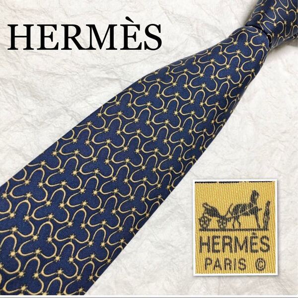 HERMES エルメス ネクタイ 金具 太陽 総柄 シルク100% フランス製 ネイビー×イエロー