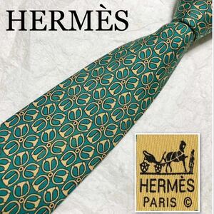 ■美品■HERMES エルメス　ネクタイ　金具　総柄　シルク100% フランス製　グリーン系　ビジネス