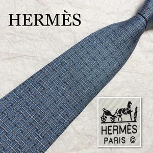 HERMES エルメス　ネクタイ　格子　金具　総柄　シルク100% フランス製　ライトブルー