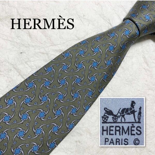 HERMES エルメス　ネクタイ　金具　総柄　シルク100% フランス製　モスグリーン×ライトブルー