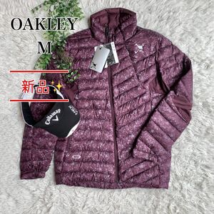 【新品未使用】OAKLEY オークリー ゴルフウェア ダウンジャケット 総柄 スカル M