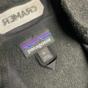 2015年 パタゴニア patagonia ポリエステル 裏起毛 ベスト 黒 ブラック XLサイズ 全体的に毛玉あり 首裏 刺繍入り Patagonia