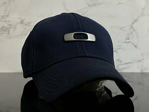 【未使用品】47F★OAKLEY オークリー キャップ 帽子 CAP 上品で高級感のあるネイビーの伸縮素材にメタル製ロゴ♪《伸縮前58㎝～62㎝位迄》