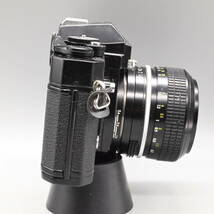 〇0599 【動作確認済み】ニコン ニコマート NIKON NIKOMAT EL ブラック + NIKKOR 1:1.4 50mm LENS レンズ 一眼レフ フィルムカメラ_画像2