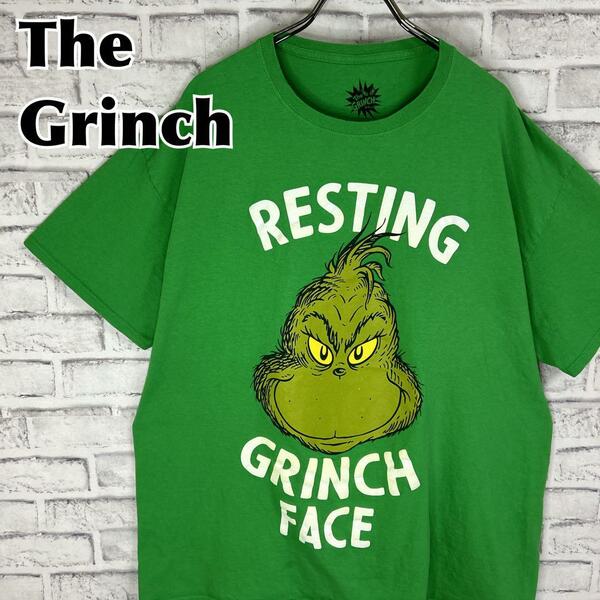 The Grinch グリンチ フェイス ロゴプリント Tシャツ 半袖 輸入品 春服 夏服 海外古着 キャラクター 絵本 アニメ ドクタースース