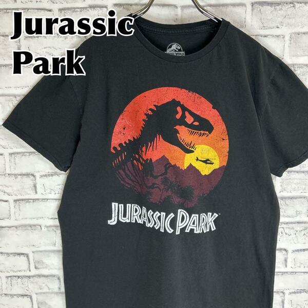 Jurassic Park ジュラシックパーク サンセット Tシャツ 半袖 輸入品 春服 夏服 海外古着 ロゴ 映画 洋画 ムービー シネマ 恐竜
