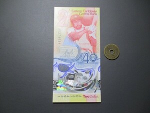 未使用　東カリブ　昨年新12月最新発行　中央銀行創立40年記念　ポリマー2ドル