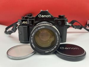 ＊ Canon A-1 フィルムカメラ 一眼レフ 鳴きあり ブラック レンズ FL 58mm 1:1.2 単焦点 動作確認済み キヤノン キャノン