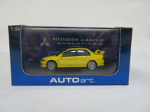 AUTOart　 MITSUBISHI LANCER EVOLUTION VII (YELLOW) ダイキャストミニカー_画像1