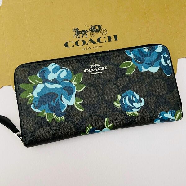 Coachコーチレディース長財布　新品　ダークブラウン色バラ柄　シグネチャー柄