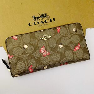 Coachコーチレディース長財布　新品　ブラウン色　蝶々柄　おすすめ！