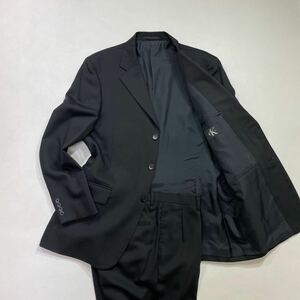 303 美品 Calvin Klein カルバン クライン スーツ セットアップ 上下 テーラードジャケット スラックス ビジネス オフィス ブラック 40314B