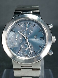 美品 CITIZEN シチズン XC クロスシー 0560-H25951 アナログ 腕時計 クロノグラフ カレンダー シアン文字盤 メタルベルト 新品電池交換済み