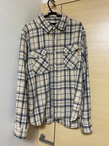【国内限定】UNDEFEATED FLANNEL SHIRT ネルシャツ チェックシャツ