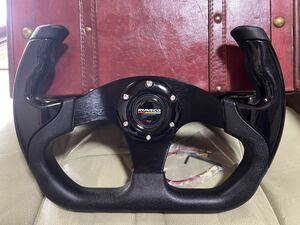 F1 steering gear yoke steering wheel MOMO pitch new goods black Manufacturers direct delivery postage included. 