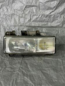 332 Isuzu CXZ72J large left . seat side head light halogen 24V KOITO 100-21660