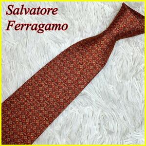 【未使用タグ付き】Salvatore Ferragamo　サルヴァトーレフェラガモ ネクタイ オレンジ 赤茶 緋色 総柄 シルク100% イタリア製 メンズ