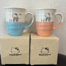 ハローキティ　Sanrio vivitix マグカップ 陶器 2003年製　サンリオ　日本製　2個　Hello Kitty ★未使用★_画像1