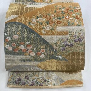 袋帯 秀品 落款 服部織物 山並み 草花 箔 ベージュ 六通 正絹 【中古】