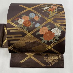 名古屋帯 秀品 草花 ヱ霞 金糸 箔 茶紫 正絹 【中古】