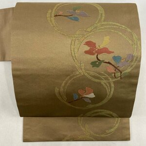 名古屋帯 美品 優品 枝花 箔 金糸 茶色 正絹 【中古】