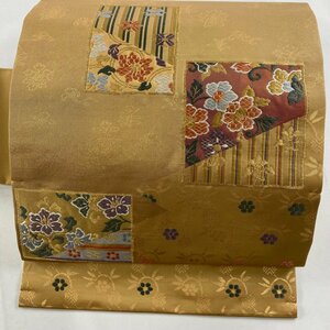 名古屋帯 美品 秀品 草花 笹蔓 金糸 箔 薄茶色 正絹 【中古】