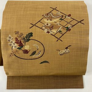 名古屋帯 美品 秀品 紬地 魚 生り物 薄茶色 正絹 【中古】