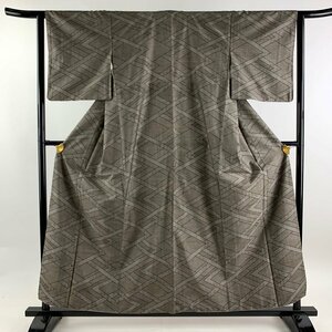 紬 身丈158cm 裄丈63cm S 袷 幾何学模様 花 焦茶色 正絹 秀品 【中古】