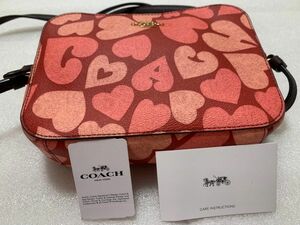 ジャスパーマルチ ハート COACH プリント ミニ カメラバッグ