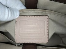 即決価格【未使用】COACH コーチ ロゴ ハンドバッグ トート 高級感 革製品 レザー レディース タグ付 ケアカード付 同梱可能_画像9