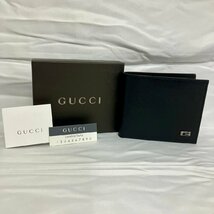 ※【美品】GUCCI グッチ 120949 Gマークシルバー 二つ折り財布 コンパクト 小銭入れあり レザーウォレット ブラック メンズ レディース兼用_画像1