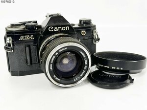 ★Canon キャノン AE-1 FD 24mm 1:2.8 一眼レフ フィルムカメラ ブラックボディ レンズ フード シャッター可能 ジャンク 15975O13-8