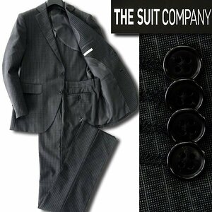 THE SUIT COMPANY