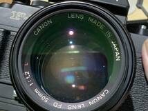 【12175】注目 シャッター◎Canon New F-1/レンズ FD 50mm 1：1.2 L/フィルムカメラ 一眼レフカメラ ボディ 高級 現状 付属 セット まとめ_画像5