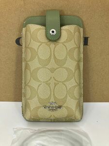 新品未使用　coachコーチ　スマホケーススマホショルダーバック　カーキグリーンシグネチャー